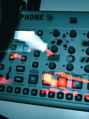 Close-up of a vintage style music console with glowing neon lights, evoking a retro tech vibe.